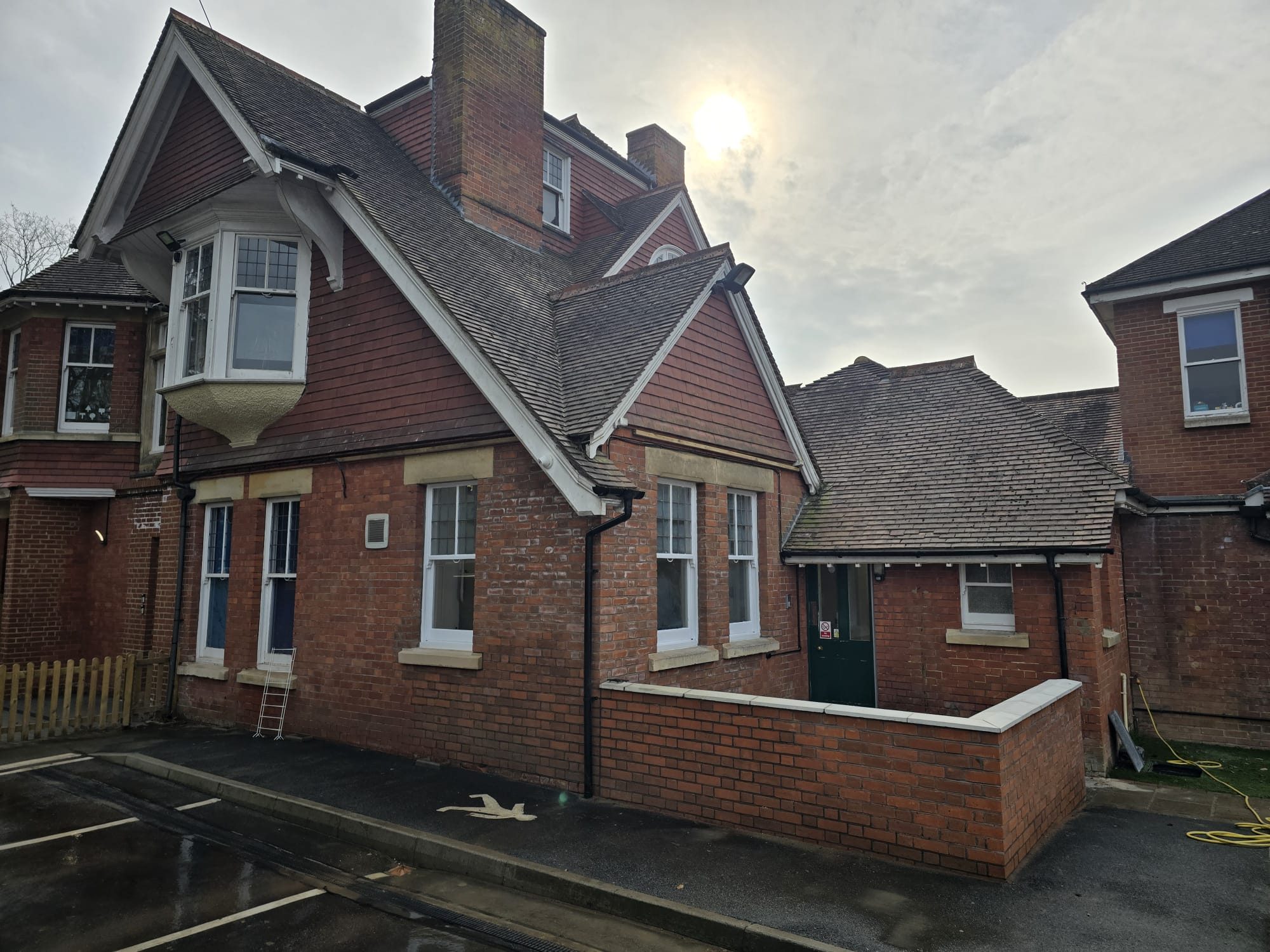 Exterior of a period property refurbished with new brickwork and windows