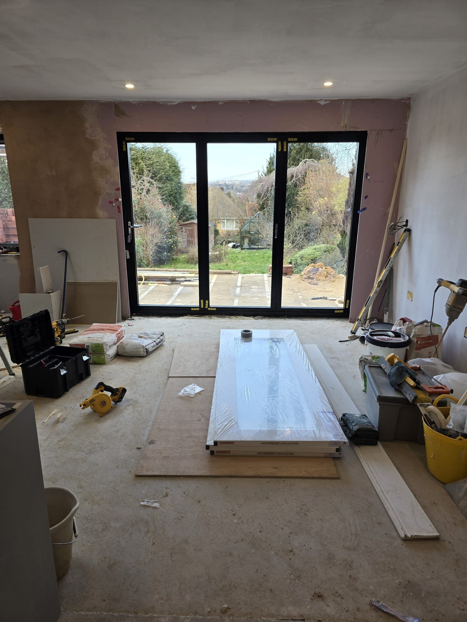 Aluminium bi-fold doors fitted to a new rear extension by Urban Build