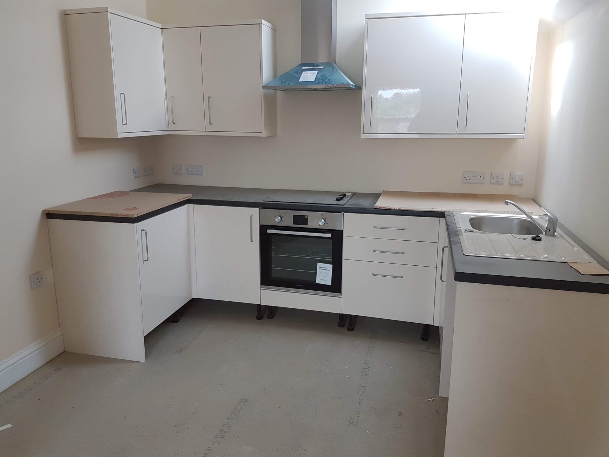 New kitchen units, oven and worktops installed in a refurbished property